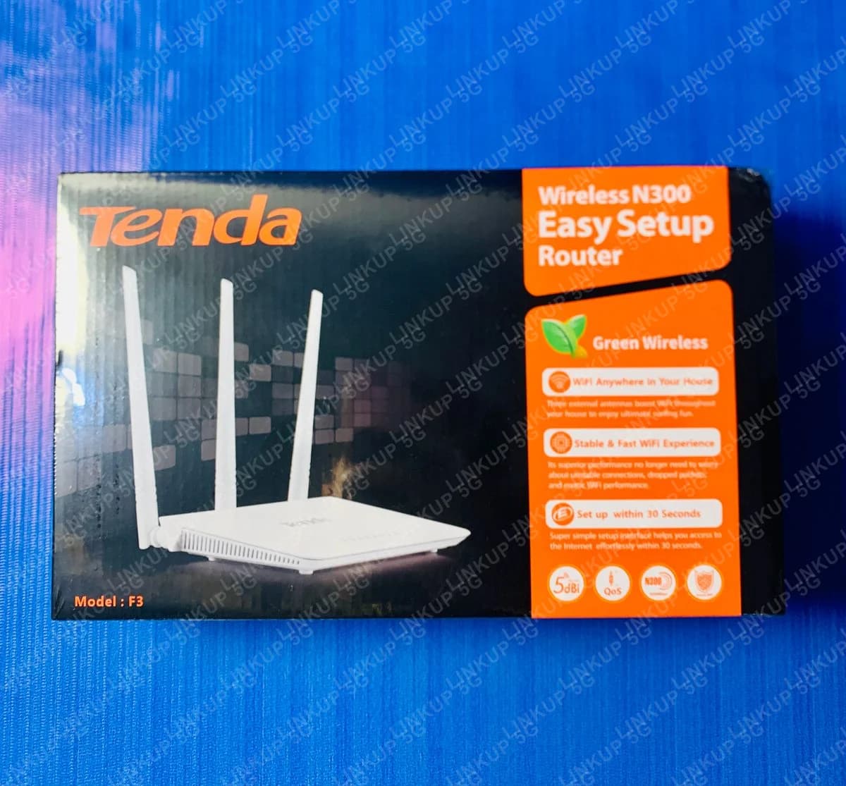 Tenda F3 Wireless N300 router retail box, front view showing the three-antenna router and key features